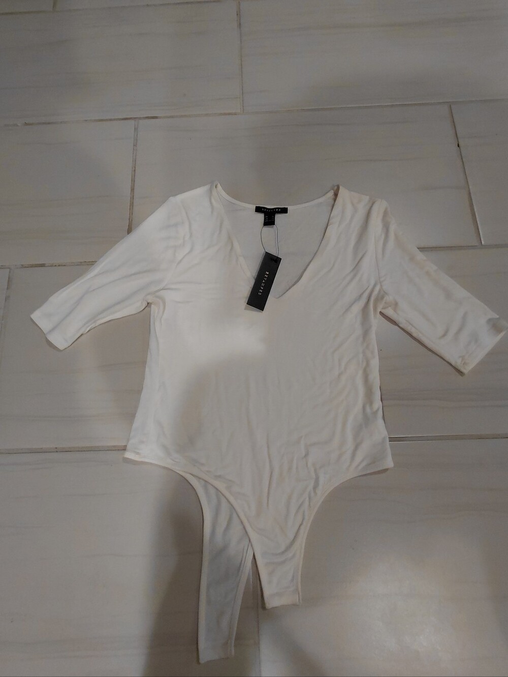 Revamped Cream Seamless Thong Bodysuit